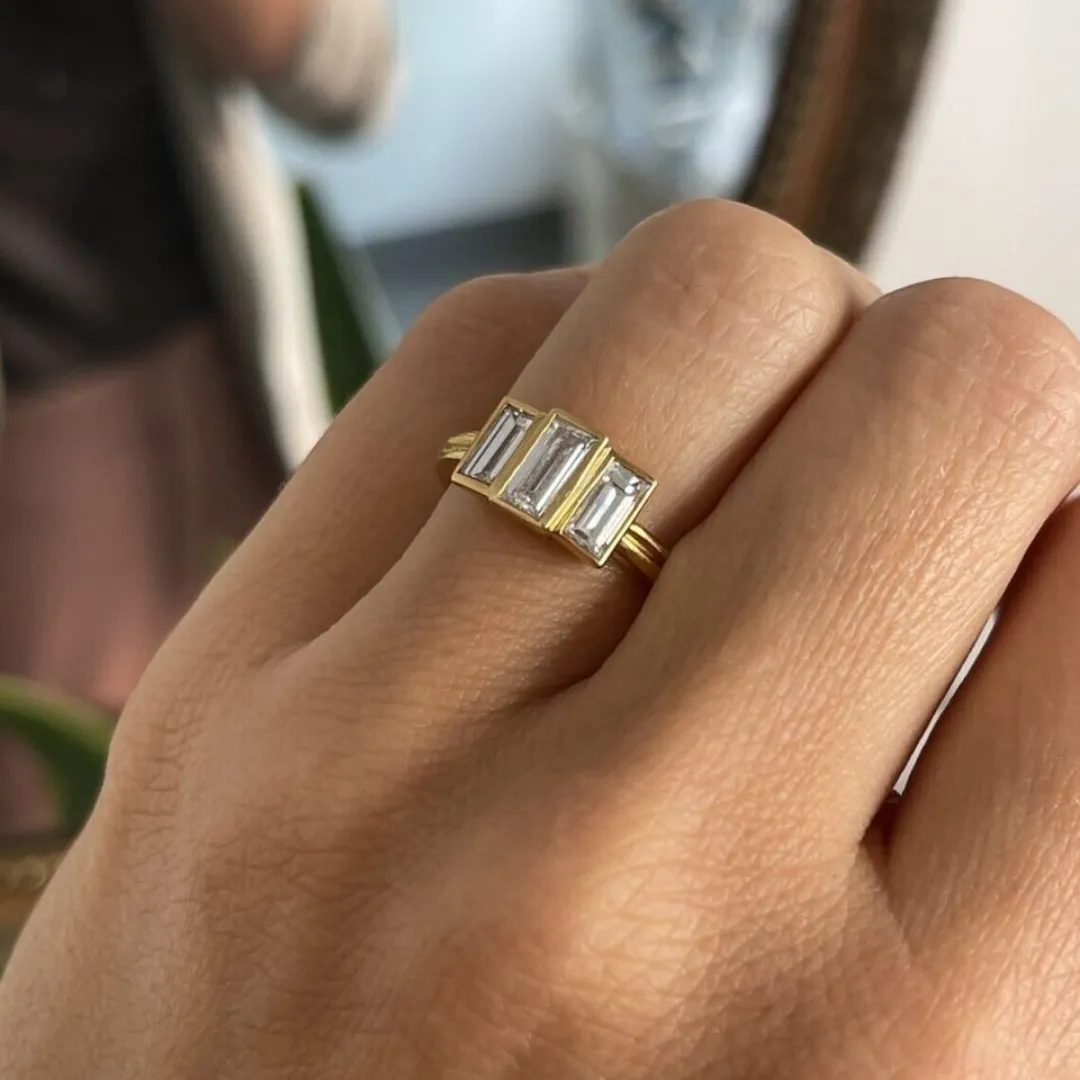/public/photos/live/Step Baguette Cut Moissanite 3 Stone Engagement Ring 697 (2).webp